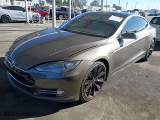 2015 Tesla Model S 85D with VIN 5YJSA1E49FF102740, listed as a IAAI auction lot 41204835 with 83575 miles. Bid and sale history available at carsss.com. Image 17.