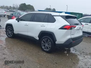 2023 Toyota RAV4 Hybrid XLE Premium with VIN JTMB6RFV4PD114763, listed as a IAAI auction lot 41766812 with 6,768 mi miles. Bid and sale history available at carsss.com. Image 3.