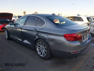 2014 BMW 5 Series 535i with VIN WBA5B1C54ED479873, listed as a IAAI auction lot 41338061 with 75,097 mi miles and . Bid and sale history available at DreamBid. Image 3.