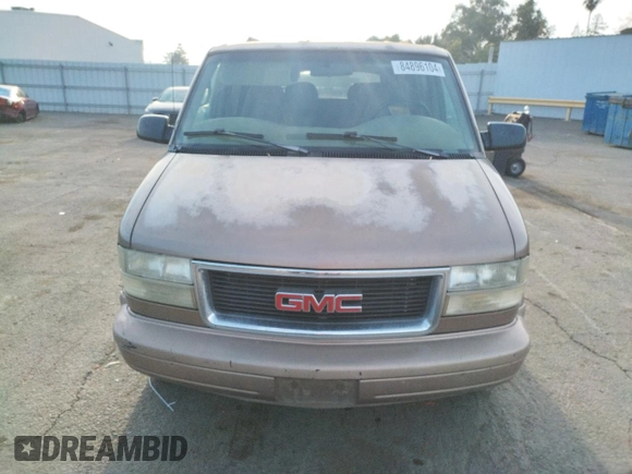 1998 GMC Safari z VIN 1GKDM19W8WB504543, wystawiony jako Copart lot #84896104 z przebiegiem Nie podano mil oraz Szkody całkowita. Historia ofert i sprzedaży dostępna na DreamBid. Obrazek 5.