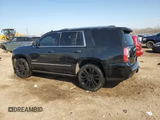 2016 GMC Yukon Denali with VIN 1GKS2CKJ9GR301628, listed as a Copart auction lot 48937035 with 121,863 mi miles and Salvage Title. Bid and sale history available at carsss.com. Image 2.