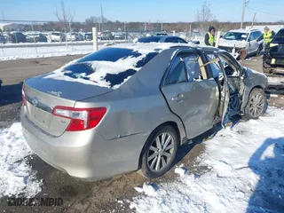2014 Toyota Camry SE with VIN 4T1BK1FK6EU026342, listed as a IAAI auction lot 41246628 with 142,586 mi miles. Bid and sale history available at carsss.com. Image 4.