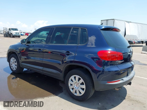 2013 Volkswagen Tiguan with VIN WVGCV3AX6DW605876, listed as a IAAI auction lot 42431619 with 106,279 mi miles and . Bid and sale history available at DreamBid. Image 3.
