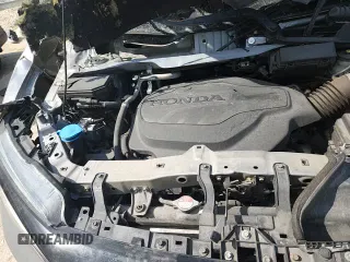 2020 Honda Passport Touring z VIN 5FNYF8H9XLB019275, wystawiony jako Copart lot #63085665 z przebiegiem 54 081 mil mil oraz Szkoda całkowita • Salvage title. Historia ofert i sprzedaży dostępna na DreamBid. Obrazek 17.