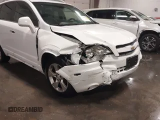 2014 Chevrolet Captiva Sport LT z VIN 3GNAL3EK8ES582752, wystawiony jako IAAI lot #40593238 z przebiegiem 224 027 mil mil oraz . Historia ofert i sprzedaży dostępna na DreamBid. Obrazek 6.