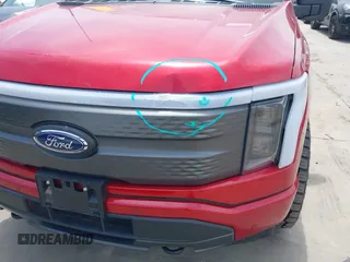 2023 Ford F-150 Lightning Pro with VIN 1FTVW1EL8PWG33656, listed as a IAAI auction lot 42260659 with 22,490 mi miles and . Bid and sale history available at DreamBid. Image 6.