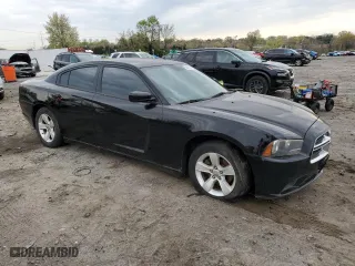 2013 Dodge Charger SE with VIN 2C3CDXBG2DH637773, listed as a Copart auction lot 53221765 with 193,590 mi miles and Clean Title. Bid and sale history available at carsss.com. Image 4.