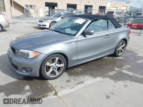 2012 BMW 1 Series 128i with VIN WBAUN1C52CVR00421, listed as a IAAI auction lot 41594256 with 107,957 mi miles and . Bid and sale history available at DreamBid. Image 17.