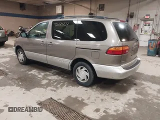 1999 Toyota Sienna LE z VIN 4T3ZF13CXXU127488, wystawiony jako IAAI lot #42334323 z przebiegiem 247 917 mil mil oraz . Historia ofert i sprzedaży dostępna na DreamBid. Obrazek 3.