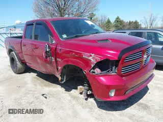 2014 Ram 1500 Sport z VIN 1C6RR7HTXES295695, wystawiony jako IAAI lot #41987164 z przebiegiem 81 823 mil mil oraz . Historia ofert i sprzedaży dostępna na DreamBid. Obrazek 1.
