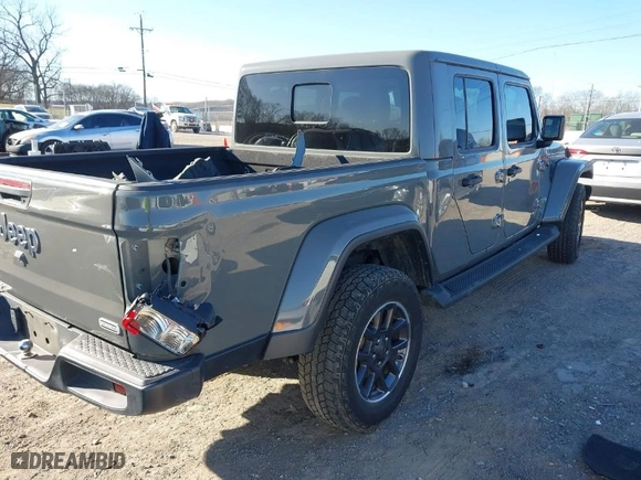 2021 Jeep Gladiator Overland with VIN 1C6HJTFG0ML507773, listed as a IAAI auction lot 41617970 with 95,816 mi miles. Bid and sale history available at carsss.com. Image 4.