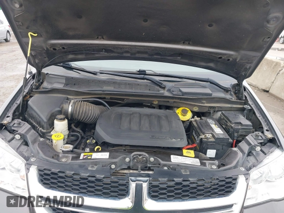 2019 Dodge Grand Caravan SXT with VIN 2C4RDGCG3KR543221, listed as a IAAI auction lot 41528859 with 129,778 mi miles and . Bid and sale history available at DreamBid. Image 10.