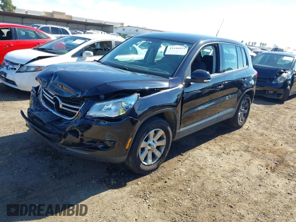2010 Volkswagen Tiguan with VIN WVGAV9AX6AW000410, listed as a IAAI auction lot 41446852 with 118,728 mi miles and . Bid and sale history available at DreamBid. Image 2.