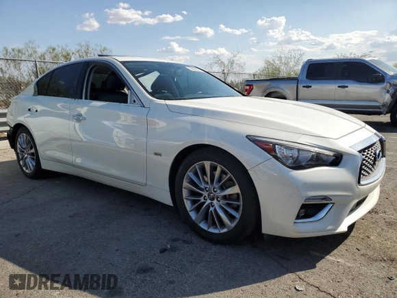 2019 Infiniti Q50 Luxe with VIN JN1EV7AP2KM515513, listed as a Copart auction lot 59893895 with 124,644 mi miles and Salvage title. Bid and sale history available at DreamBid. Image 4.