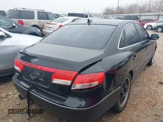 2009 Hyundai Azera Limited with VIN KMHFC46F49A392441, listed as a IAAI auction lot 41285125 with 122,613 mi miles and . Bid and sale history available at DreamBid. Image 4.