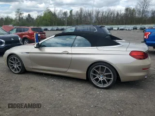 2012 BMW 6 Series 650i z VIN WBALZ3C52CC397545, wystawiony jako Copart lot #55976625 z przebiegiem 147 352 mil mil oraz Tytuł czysty. Historia ofert i sprzedaży dostępna na DreamBid. Obrazek 2.