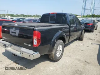2014 Nissan Frontier SV with VIN 1N6AD0FV7EN736839, listed as a Copart auction lot 58390995 with 111,403 mi miles and Salvage title. Bid and sale history available at DreamBid. Image 3.