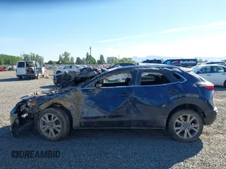 2023 Mazda CX-30 S Premium с VIN 3MVDMBDM7PM519793, выставлен на аукционе IAAI как лот 42184088 с пробегом 48 844 миль миль и . История ставок и продаж доступна на DreamBid. Изображение 14.