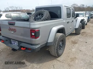 2021 Jeep Gladiator Mojave with VIN 1C6JJTEG9ML519309, listed as a IAAI auction lot 41701544 with 64,461 mi miles and . Bid and sale history available at DreamBid. Image 4.