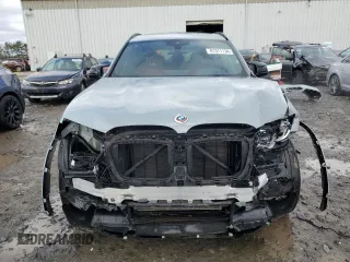 2023 BMW X3 M with VIN 5YM13EC02P9S08561, listed as a Copart auction lot 81371134 with 15,589 mi miles and Salvage Title. Bid and sale history available at carsss.com. Image 5.