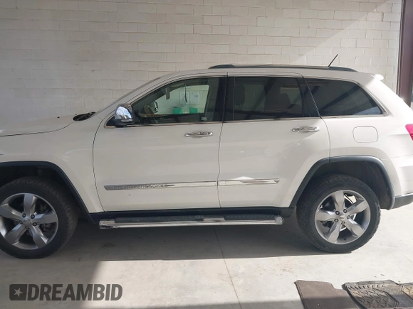 2011 Jeep Grand Cherokee Overland with VIN 1J4RR6GG0BC683624, listed as a IAAI auction lot 42729697 with 212,739 mi miles and . Bid and sale history available at DreamBid. Image 14.