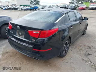 2014 Kia Optima LX with VIN 5XXGM4A74EG338058, listed as a IAAI auction lot 41723390 with 155,840 mi miles. Bid and sale history available at carsss.com. Image 4.