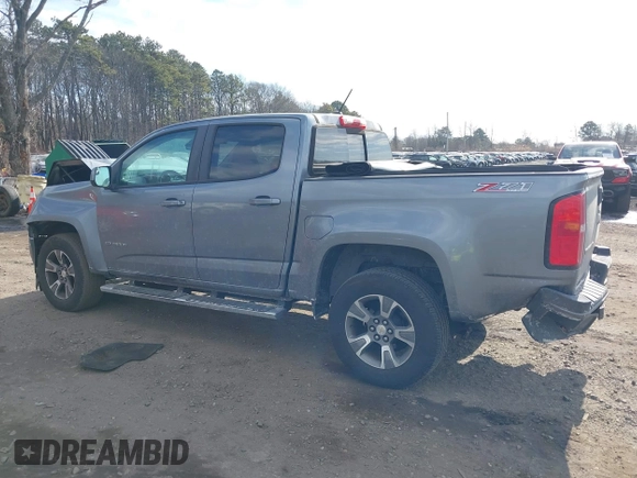 2018 Chevrolet Colorado 4WD Z71 z VIN 1GCGTDENXJ1133572, wystawiony jako IAAI lot #41437941 z przebiegiem 82 254 mil mil oraz . Historia ofert i sprzedaży dostępna na DreamBid. Obrazek 14.