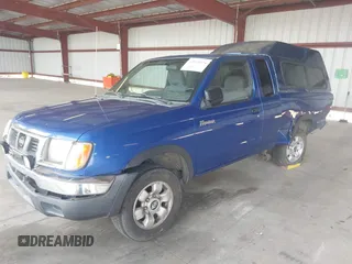 1998 Nissan Frontier XE with VIN 1N6DD26S5WC316170, listed as a IAAI auction lot 42113974 with 246,786 mi miles and . Bid and sale history available at DreamBid. Image 2.