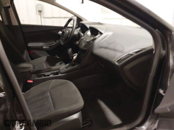 2015 Ford Focus SE with VIN 1FADP3F29FL203084, listed as a IAAI auction lot 42357973 with 99,002 mi miles and . Bid and sale history available at DreamBid. Image 5.
