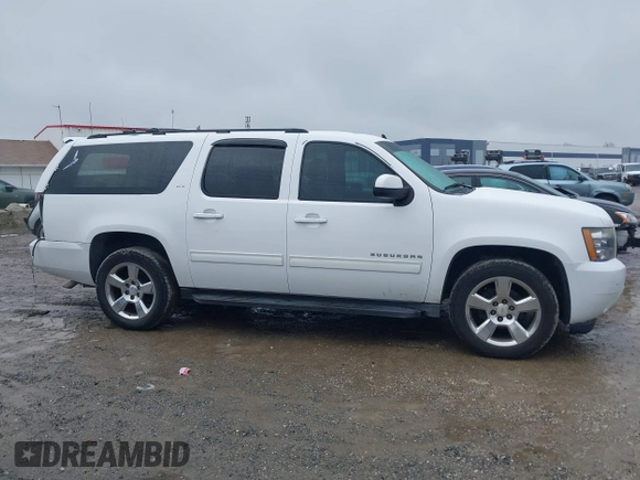 2014 Chevrolet Suburban LT with VIN 1GNSCJE06ER154639, listed as a IAAI auction lot 41410623 with 213,592 mi miles. Bid and sale history available at carsss.com. Image 13.