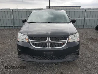 2015 Dodge Grand Caravan SE with VIN 2C4RDGBGXFR744203, listed as a Copart auction lot 54791795 with 216,594 mi miles and Clean Title. Bid and sale history available at DreamBid. Image 5.