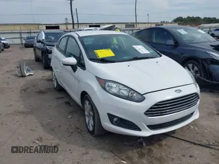 2019 Ford Fiesta SE z VIN 3FADP4BJ8KM149188, wystawiony jako IAAI lot #41689670 z przebiegiem 86 380 mil mil oraz . Historia ofert i sprzedaży dostępna na DreamBid. Obrazek 1.