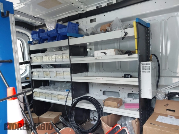 2015 Ford Transit Cargo with VIN 1FTNR1CM2FKB29029, listed as a IAAI auction lot 42286089 with 130,845 mi miles and . Bid and sale history available at DreamBid. Image 8.