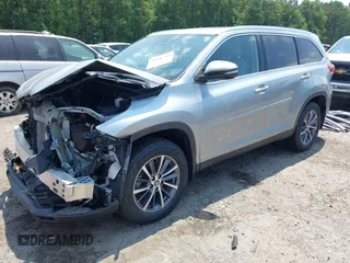 2019 Toyota Highlander SE with VIN 5TDJZRFH6KS614952, listed as a IAAI auction lot 42636713 with 65,471 mi miles and . Bid and sale history available at DreamBid. Image 2.