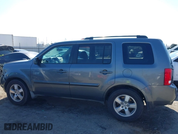 2009 Honda Pilot EX with VIN 5FNYF48439B036957, listed as a IAAI auction lot 41656284 with 199,115 mi miles. Bid and sale history available at carsss.com. Image 14.