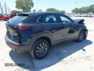 2021 Mazda CX-30 S with VIN 3MVDMAAL7MM268341, listed as a IAAI auction lot 42051154 with 19,539 mi miles and . Bid and sale history available at carsss.com. Image 4.