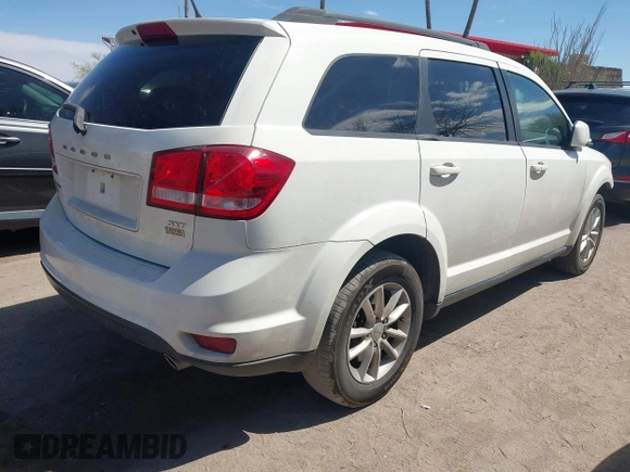 2015 Dodge Journey SXT with VIN 3C4PDCBG5FT644488, listed as a IAAI auction lot 41884638 with 102,677 mi miles and . Bid and sale history available at DreamBid. Image 4.