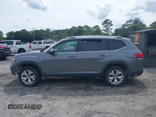 2018 Volkswagen Atlas SE z VIN 1V2CR2CA2JC505488, wystawiony jako IAAI lot #42396518 z przebiegiem 92 806 mil mil oraz . Historia ofert i sprzedaży dostępna na DreamBid. Obrazek 13.