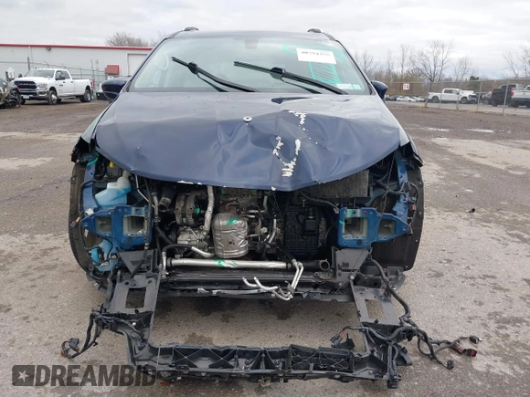 2018 Chrysler Pacifica Touring L z VIN 2C4RC1BG6JR233614, wystawiony jako IAAI lot #40794355 z przebiegiem 52 469 mil mil oraz . Historia ofert i sprzedaży dostępna na DreamBid. Obrazek 13.