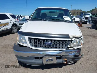 2001 Ford F-150 XL z VIN 1FTRF17W61NB22632, wystawiony jako IAAI lot #41824156 z przebiegiem Nie podano mil oraz . Historia ofert i sprzedaży dostępna na DreamBid. Obrazek 12.