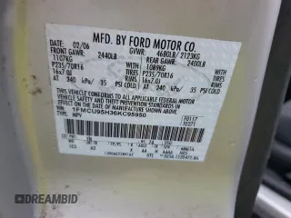 2006 Ford Escape Hybrid with VIN 1FMCU95H36KC95950, listed as a Copart auction lot 83957834 with 139,141 mi miles and Salvage title. Bid and sale history available at DreamBid. Image 14.