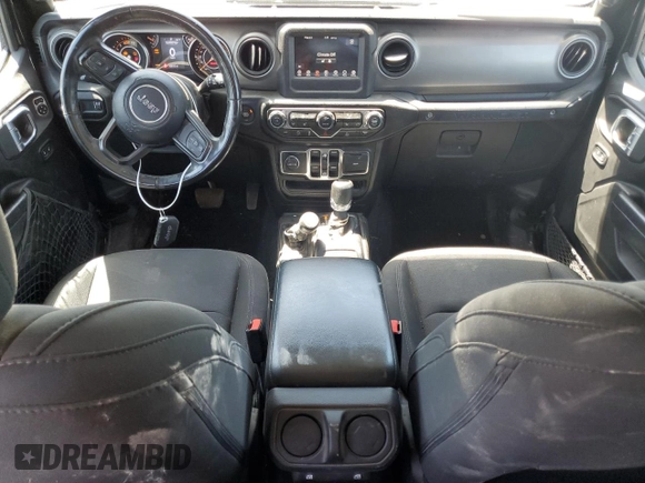 2023 Jeep Wrangler Sport S with VIN 1C4HJXDN9PW564543, listed as a Copart auction lot 56192945 with 42,015 mi miles and Salvage title. Bid and sale history available at DreamBid. Image 8.