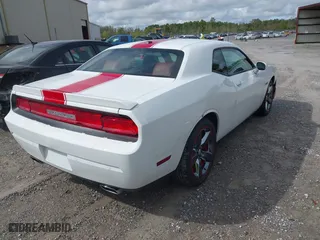 2013 Dodge Challenger SXT with VIN 2C3CDYAG9DH734248, listed as a IAAI auction lot 41837944 with 113,142 mi miles. Bid and sale history available at carsss.com. Image 4.