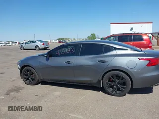 2018 Nissan Maxima SL with VIN 1N4AA6AP9JC360485, listed as a IAAI auction lot 42206521 with 140,898 mi miles and . Bid and sale history available at DreamBid. Image 14.