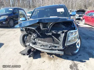 2015 Chevrolet Tahoe LTZ with VIN 1GNSKCKC6FR190314, listed as a IAAI auction lot 41672237 with 176,439 mi miles. Bid and sale history available at carsss.com. Image 12.