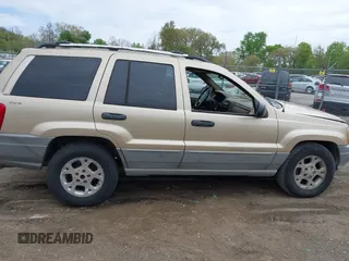 2000 Jeep Grand Cherokee Laredo with VIN 1J4GW48SXYC100248, listed as a IAAI auction lot 42182318 with 227,658 mi miles and . Bid and sale history available at DreamBid. Image 13.