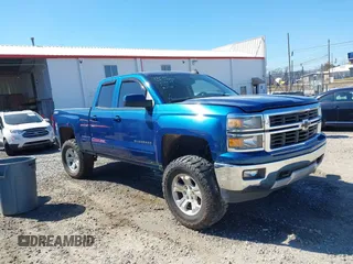 2015 Chevrolet Silverado 1500 LT with VIN 1GCRCREC1FZ308160, listed as a IAAI auction lot 41650625 with 174,936 mi miles. Bid and sale history available at carsss.com. Image 1.