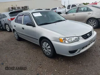 2002 Toyota Corolla CE with VIN 1NXBR12E02Z601042, listed as a IAAI auction lot 42605552 with 121,159 mi miles and . Bid and sale history available at DreamBid. Image 1.