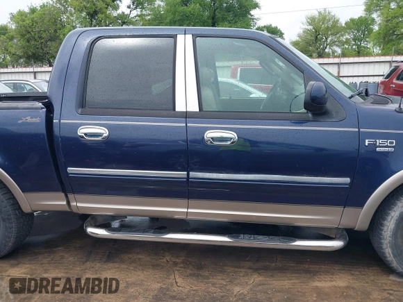 2003 Ford F-150 XLT with VIN 1FTRW07L33KC83234, listed as a IAAI auction lot 41894573 with 215,232 mi miles. Bid and sale history available at carsss.com. Image 13.