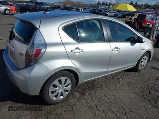 2014 Toyota Prius One z VIN JTDKDTB32E1574607, wystawiony jako IAAI lot #41724312 z przebiegiem 102 612 mil mil oraz . Historia ofert i sprzedaży dostępna na DreamBid. Obrazek 4.